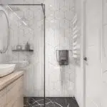 Dekoracyjne kafle geometryczne na ścianie pod prysznicem