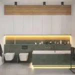 Nowoczesna łazienka w minimalistycznym stylu z kontrastującymi kaflami w kolorze zielonym i nastrojowym podświetleniem LED