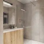 Łazienka z przestronną, przeszkloną kabiną prysznicową i drewnianymi meblami