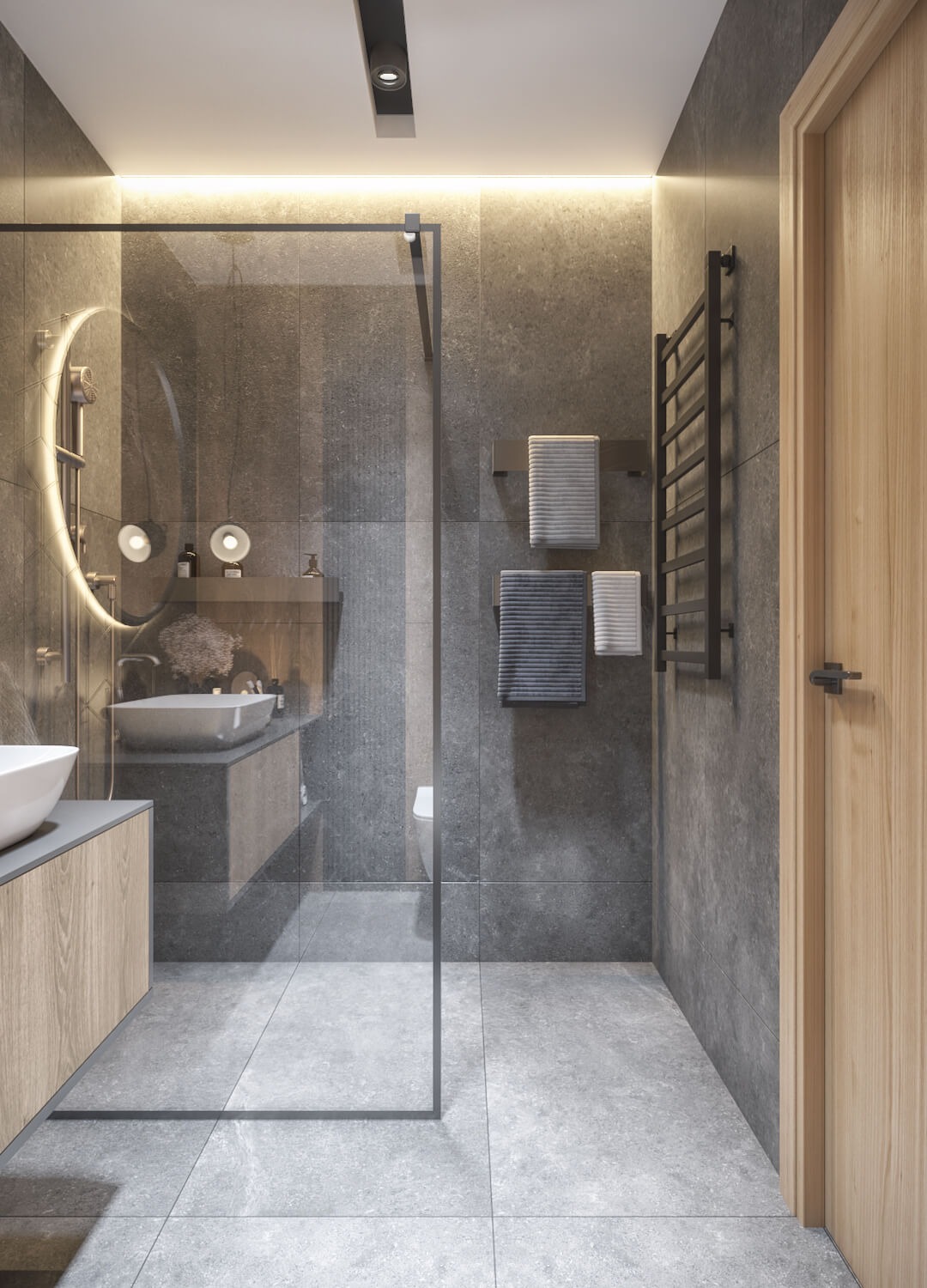 Łazienka z przeszkloną kabiną prysznicową i ciemnymi płytkami z drewnianymi elementami